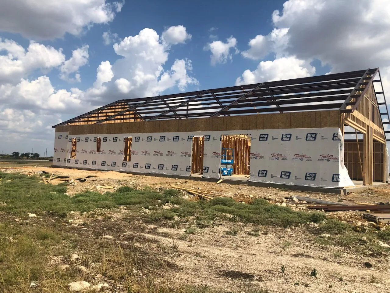 Metal barndominium construction in development by our team.