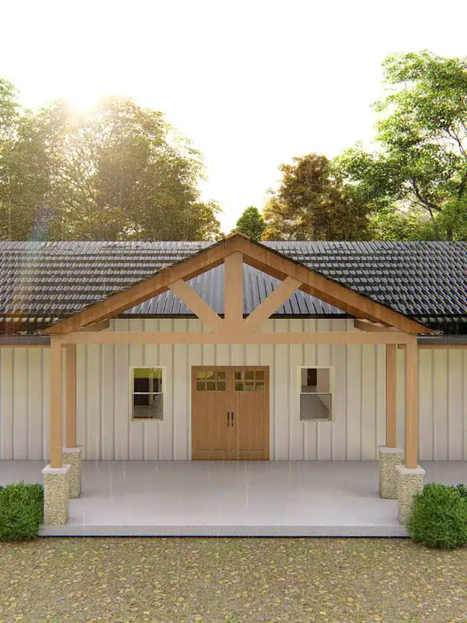 Front exterior of a custom barndominium in South Texas featuring metal siding, covered porch, and climate-appropriate design.