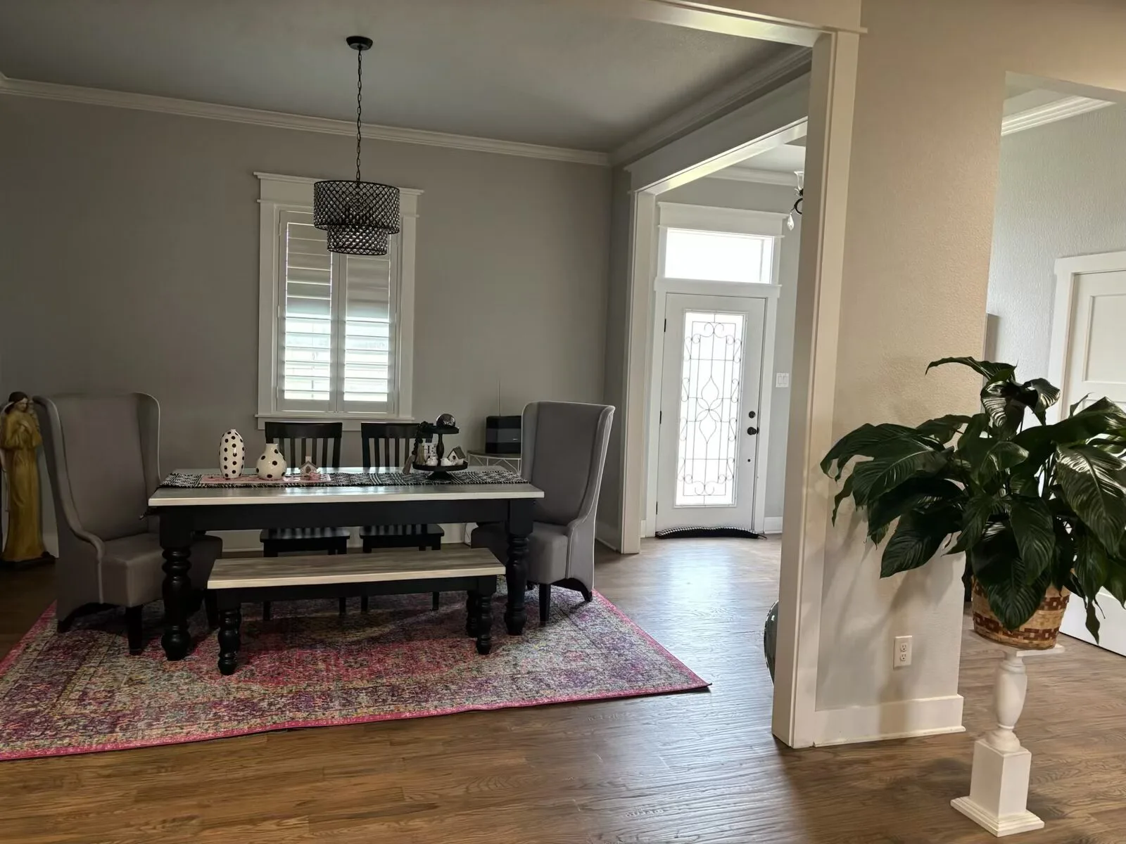 Spacious dining area with elegant decor.