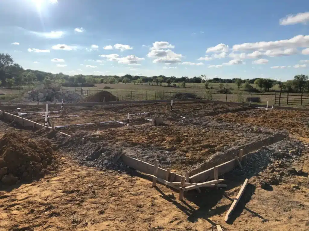 land preparation for a barndo build work in rural part of North Texas