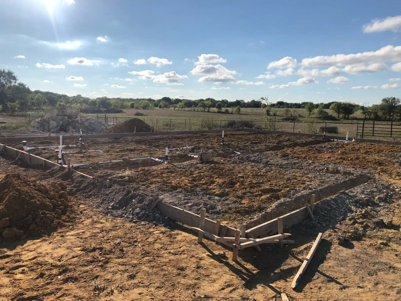 plot of land in Texas, that was prepared for a barndominium construction plan