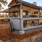 Texas barndominium with a basement cutaway showing the relationship between the living space, foundation, soil and below-grade construction.